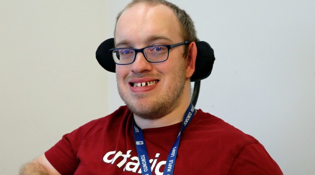 Brock Richardson faces the camera, smiling